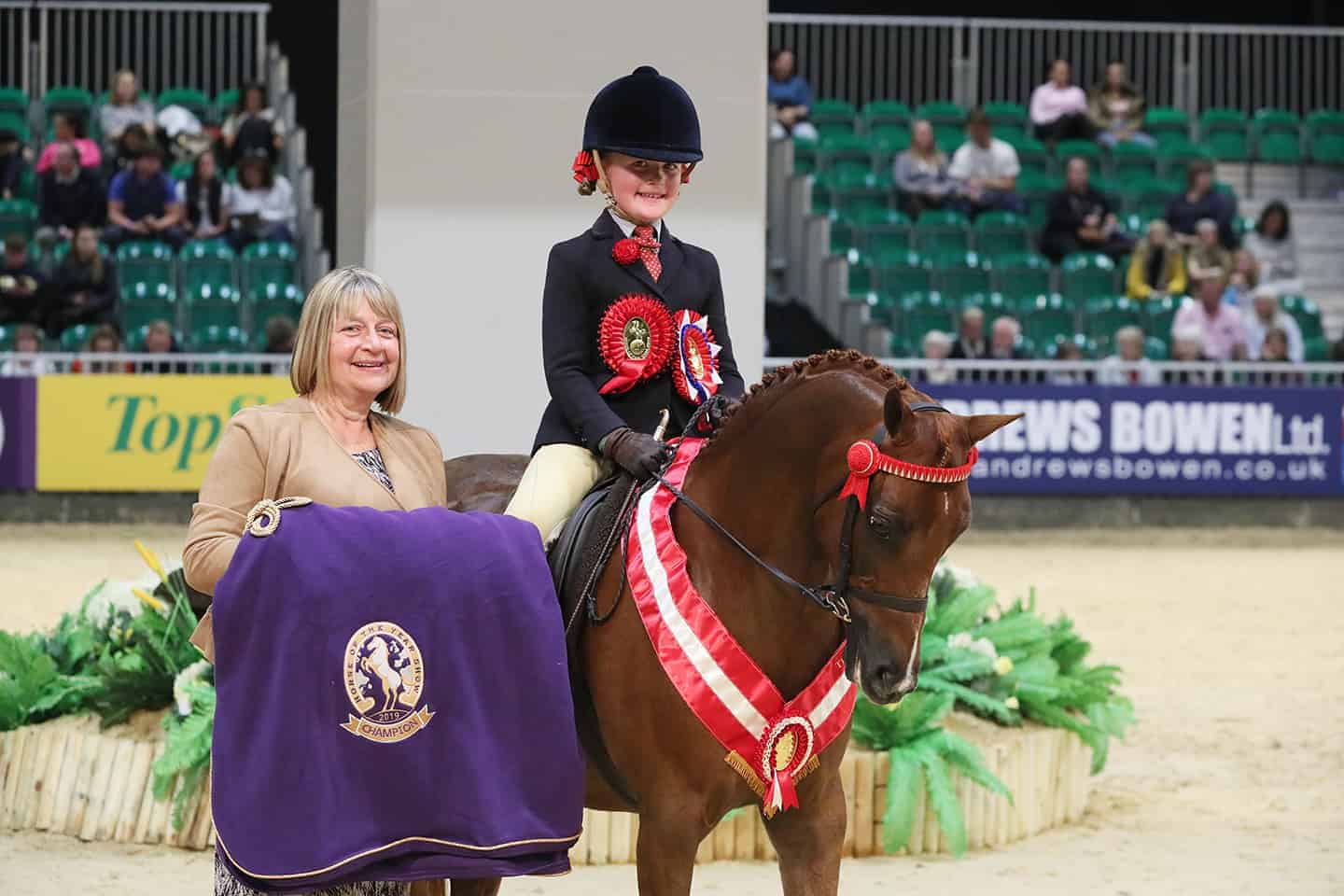 Sisters celebrate in The Price Family Mini Show Pony of the Year Championship Horse of the